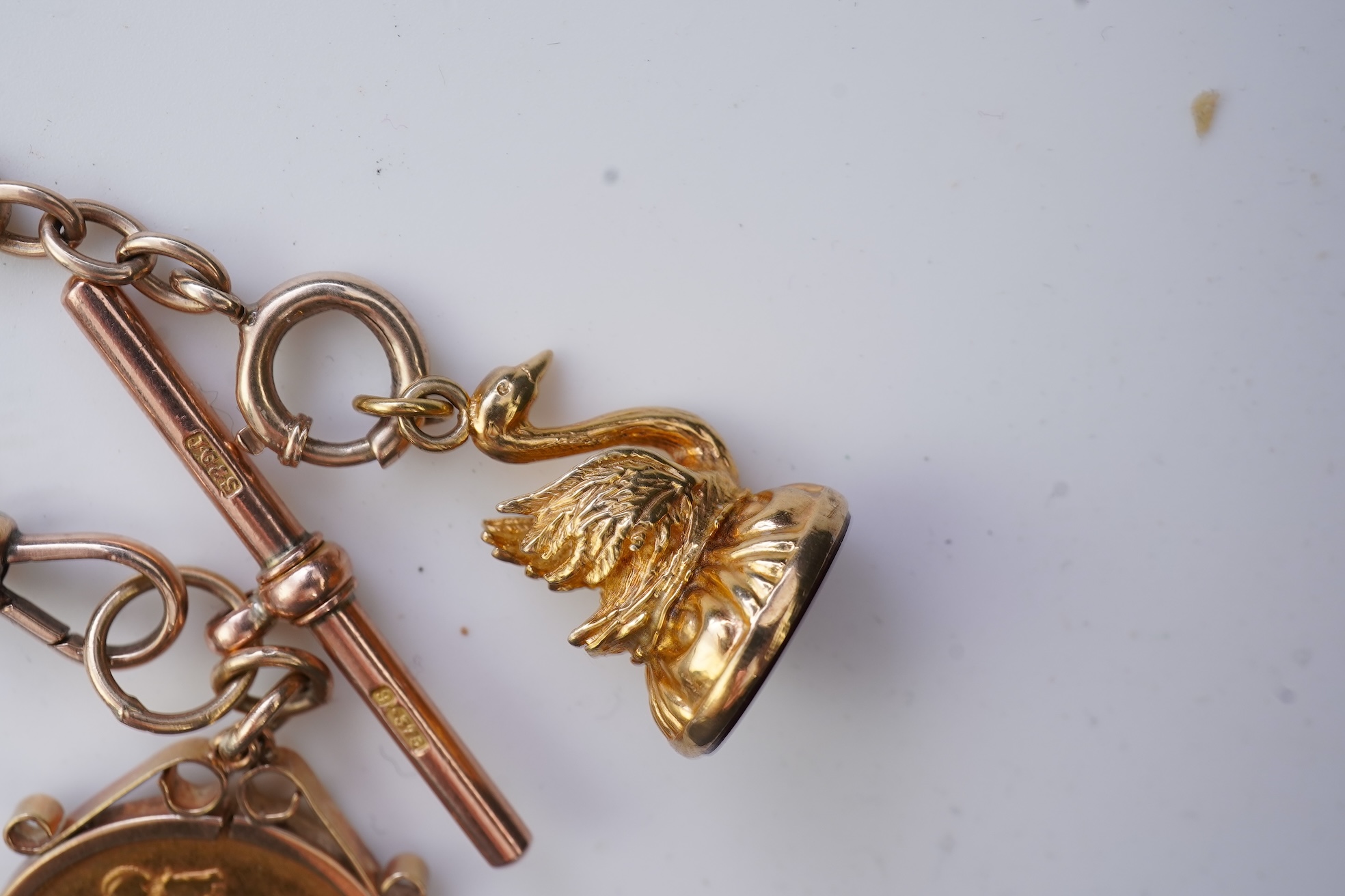 A gold Albert chain, sovereign coin pendant and fob seal, early 20th century
